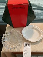 Photo showing Villeroy & Boch branded box, crystal bowl with labeled sticker, and white porcelain bowl.