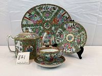 Group shot: platter, small plate, teapot, teacup with saucer