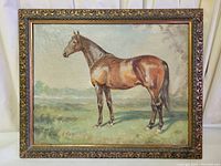 Full view of the antique gilt-framed oil painting featuring a standing horse on grass under a light sky background.