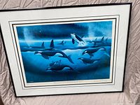 Full front view of framed print on cloth backdrop