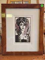 Framed lino print of a woman titled 'Barb', signed by Gordon Ramsay, showing the full frame, mat, and artwork.