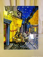 Front view of glazed tile showing Cafe at Night artwork with vivid colors and nighttime street scene.