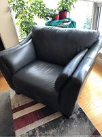 Front three-quarter view showing overall shape and cushion attachment