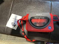Front view of Sony My First Sony Walkman cassette player with red strap and logo visible.