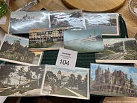 Top side of 10 vintage postcards showing various scenic and historic images.