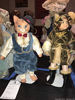 Full view of KingState Doll Crafter Cat and Little Arthur Doll together showing outfits and facial details