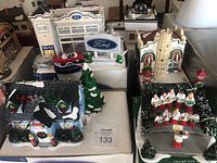 Overview of all Department 56 Snow Village pieces displayed on white base