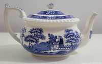 Front view of Spode Blue Tower teapot showing scenic blue transferware design
