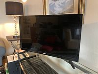 Front view of the 26-inch RCA flat-screen TV showing the complete screen and bezel with RCA logo on the front center.