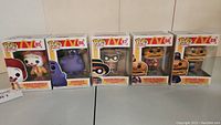 Photo showing all five McDonald's Funko Pop figures in sealed boxes: Ronald McDonald, Grimace, Hamburglar, Mayor McCheese, Officer Mac.