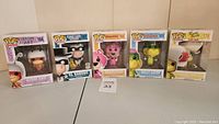 Five Funko Pop Animation vinyl figures in original boxes: Atom Ant, El Kabong, Snagglepuss, Wally Gator, and Touche Turtle.