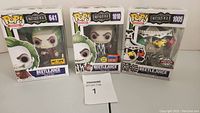 Three boxed Beetlejuice Pop! Figures showing overall lot contents