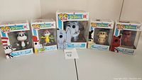 Group photo of five Funko Pop! figures from Dr. Seuss series in original boxes: Cat in the Hat, Sam I Am, Sam's Friend, Fox in Socks, and Horton.