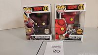 Two boxed Funko Pop! Hellboy Comics figures: Anung Un Rama #15 Specialty Edition and Hellboy #01 Chase Limited Edition.