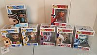 Full set of seven Disney Aladdin Pop! vinyl figures in original boxes arranged for clear visibility and identification.