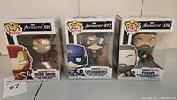 Front view of three boxed Funko Pop Marvel Avengers bobble-heads: Iron Man #626, Captain America #627, Thor #628