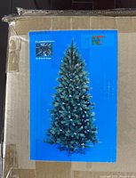 Photo of the original tree box showing an image of the 7-foot tall tree model and some features.