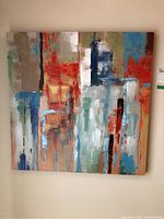 Full view of the abstract stretched canvas painting showing composition and color palette.