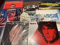 Group shot of all eight record jackets