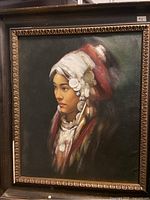 Full view of framed oil portrait painting