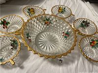 Full set showing large bowl and six smaller bowls