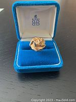 Top view of ring inside Birks box