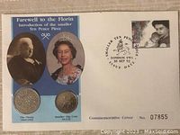 Commemorative cover showing Farewell to the Florin introduction of the smaller ten pence piece with images of Queen Elizabeth and King Edward VII, and two historic coins.