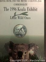 Photo of coin display card showing the 1996 Koala Exhibit at Metro Toronto Zoo with a depiction of the coin and text.