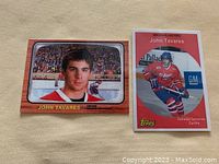 Two John Tavares hockey cards: one headshot portrait, one action shot on ice in Oshawa Generals uniform.