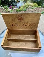Open view of wooden Vine Cliff Winery box showing interior and wooden divider.