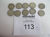 Top view of 10 circulated Canadian silver dimes laid out showing front and reverse sides with maxsold label beneath