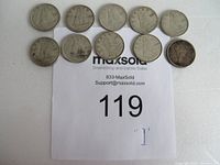 Ten circulated Canadian silver dimes laid out in two rows showing the reverse side with the sailing ship design.