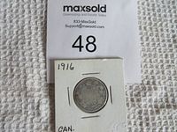 Photo showing front of worn 1916 Canadian 25 cent silver coin mounted in white card holder with date and partial text visible.