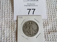 1939 Walking Liberty half dollar coin obverse side showing Lady Liberty walking with sun behind her.