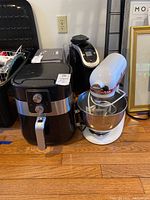 Photo showing the KitchenAid mixer, AmazonBasics air fryer, and coffee maker.