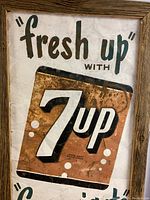 Front view showing 'Fresh Up with 7 Up' text and logo, with visible age and repainting on white background.