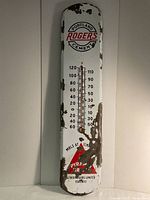 Full front view of thermometer showing overall graphics and wear