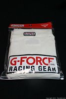 Packaged G-Force Racing Gear fire retardant underwear top in natural color, size small, showing front label and branding.