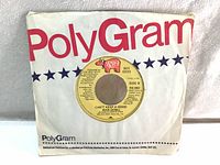Front photo of 7-inch vinyl single record "Can't Keep A Good Man Down" by Bee Gees with PolyGram paper sleeve