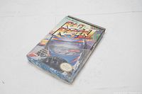 Full view of vintage Rad Racer 2 cartridge box wrapped in original shrink wrap with bright artwork and no visible damage.