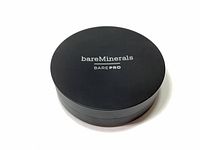 Top view of closed black compact case with 'bareMinerals BarePro' printed on lid.