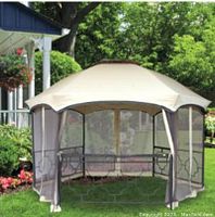 Assembled gazebo exterior showing beige canopy, mesh side netting and black powder-coated frame