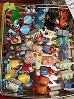 Overview of entire collection showing multiple Wade ceramic teapots in various shapes and colors.