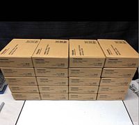 Stack of 20 boxed Toshiba mobile tablet cradles.