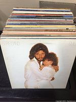 Front of vinyl album collection showing Barbra Streisand and Barry Gibb album at front
