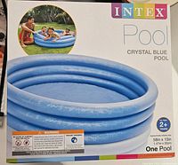 Photo of the Intex Crystal Blue Pool box showing product image and details such as size and age suitability.