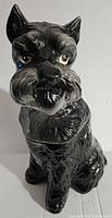 Full side view of black ceramic Scottie dog cookie jar showing detailed fur texture and shape.