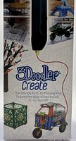 Front packaging of 3Doodler Create+ 3D printing pen showing 3D printed art samples, branding, and pen design