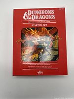 Photo of Dungeons & Dragons Starter Set red box with dragon artwork on cover.