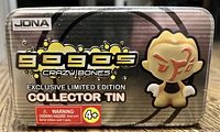 Front view of the GOGOs Crazy Bones Exclusive Limited Edition Collector Tin showing artwork, branding and safety warning.